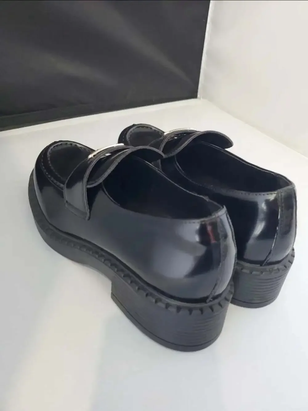 Prada Spazzolato Brushed Leather Loafers with Metal Triangle Logo